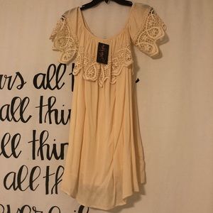 Stella Rae’s off the shoulder cream white dress